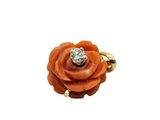 an image of an orange rose with a diamond in the center