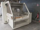 an image of a machine that is in a warehouse
