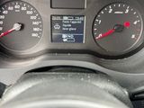 a close up of a car dashboard with a speedometer and gauges