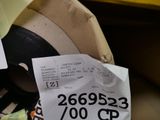 a hat that is sitting on top of a pile of paper