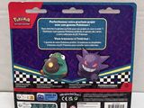 a close up of a card with a pokemon figure on it