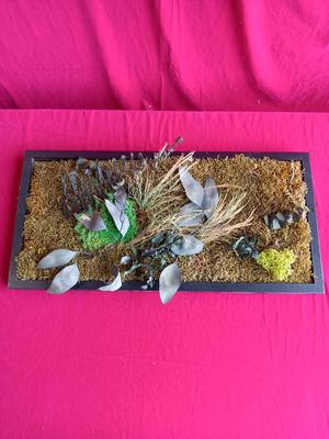 a picture of a flower arrangement on a pink cloth
