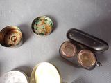 several tins of food sitting on a table next to each other