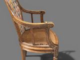 an image of a wooden chair with a patterned seat and back