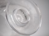 a close up view of a glass with a small object in it