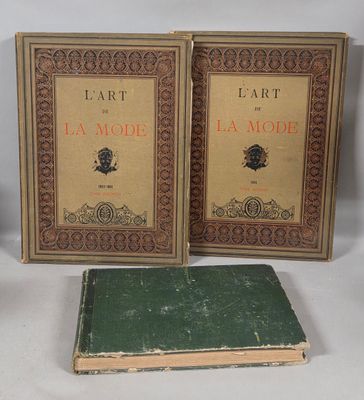 two books are sitting next to each other on a white surface
