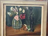 a painting of a vase of flowers on a easel
