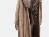 an image of a coat hanging on a hanger
