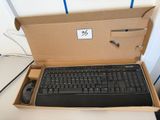 a box with a keyboard and mouse inside of it