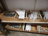 a wooden shelf with many different tools on top of it
