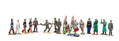 a lot of figurines that are standing in a row