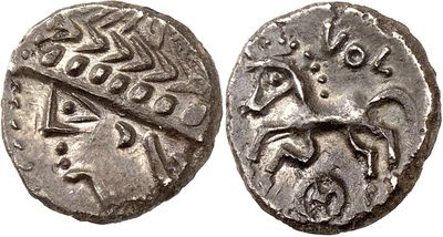 a silver coin with an image of a man and a woman on it