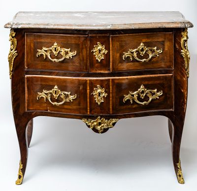 a marble top chest of drawers on a stand