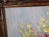 a picture of a painting of flowers in a gold frame