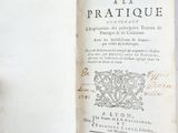 someone is holding a book open to a page with a picture on it