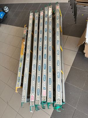 a pile of boxes and a bunch of boxes on the floor