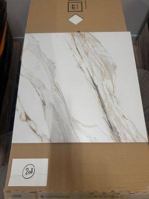 a cardboard box with a picture on it sitting on top of a table
