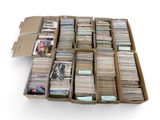 a lot of cds in a cardboard box on the floor