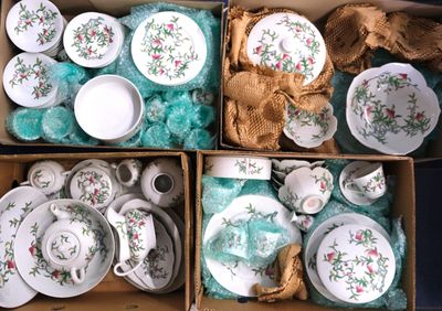 two boxes of tea cups and saucers in the same box