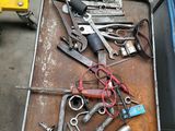 a lot of tools that are sitting on a table
