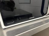 a microwave that is sitting on top of a counter