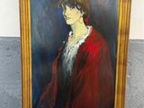 tableau représentant une femme vêtue d'un manteau rouge, dans un cadre doré