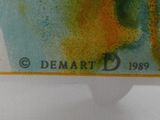 a close up of a business card with a picture of a bird