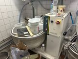 an image of a kitchen with a mixer and other items