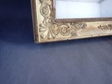 a picture of a gold frame on a blue background