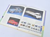 an open book with pictures of cars and trucks on it