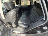 the back seats of a car are empty in the back of the vehicle