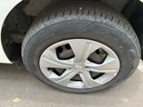 a close up of a tire on a car ' s rim
