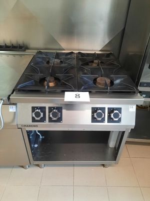 a stainless steel stove and oven in a kitchen