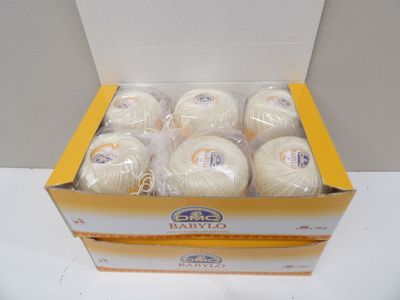 a box of yarn that is sitting on a table