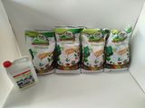 five bags of food sitting on a shelf next to a bottle of liquid