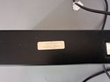 a black box with a label on it sitting on a table