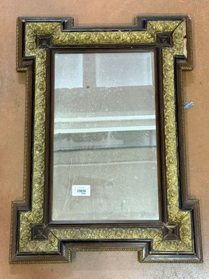 MIROIR de cheminée en bois noirci et doré.