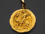 gros plan d'une pièce d'or avec un homme sur un cheval