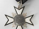 an image of a medal with a ribbon around it on a white surface