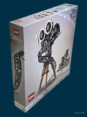 a box that has a toy camera on top of it