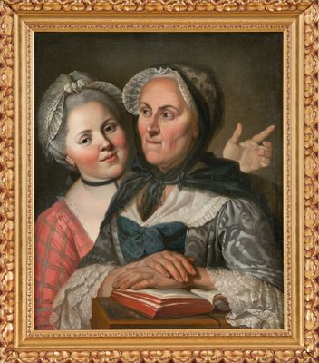un tableau représentant deux femmes tenant un livre à la main