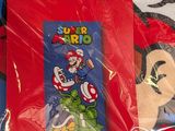 a picture of a super mario towel on a table