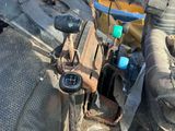 a close up of a machine with a hose attached to the back of it