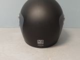 a black helmet that is sitting on a table