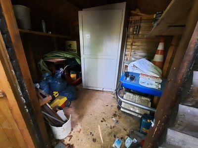 a small room with a lot of clutter in it