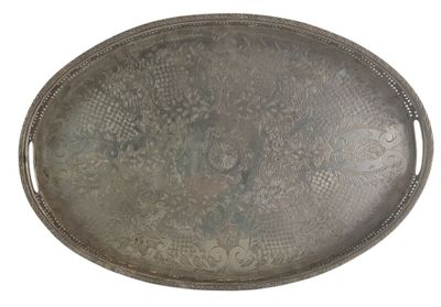 an image of a silver tray with a floral design on it