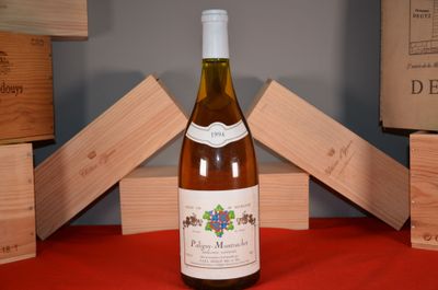 a bottle of wine that is sitting on a table