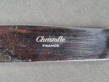 a close up of a knife on a table
