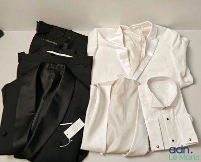 a white shirt and black pants sitting next to each other