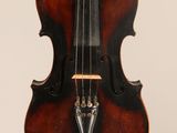 an antique violin with a wooden case and bow on a white background